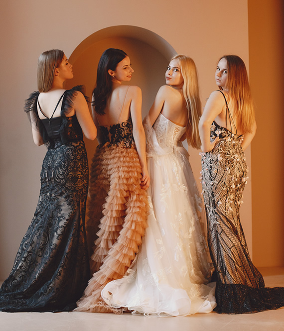 elegant women in long gowns
