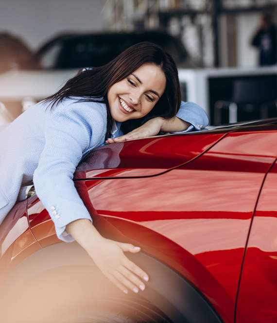 woman buys a new car
