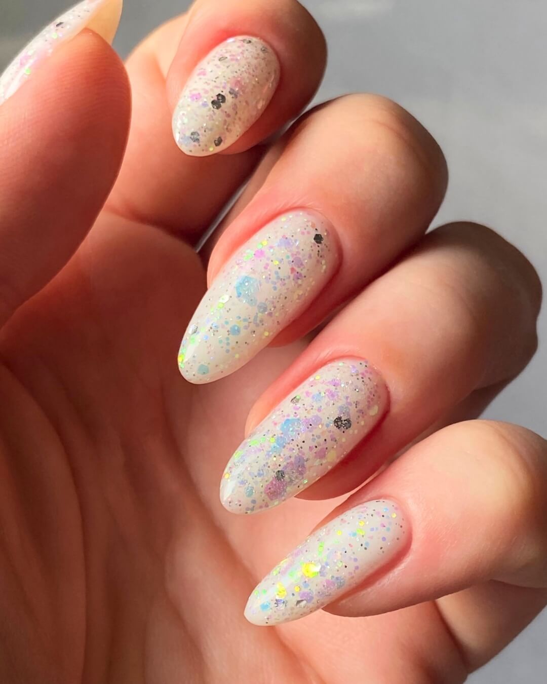 Spring nails design with colorful glitter