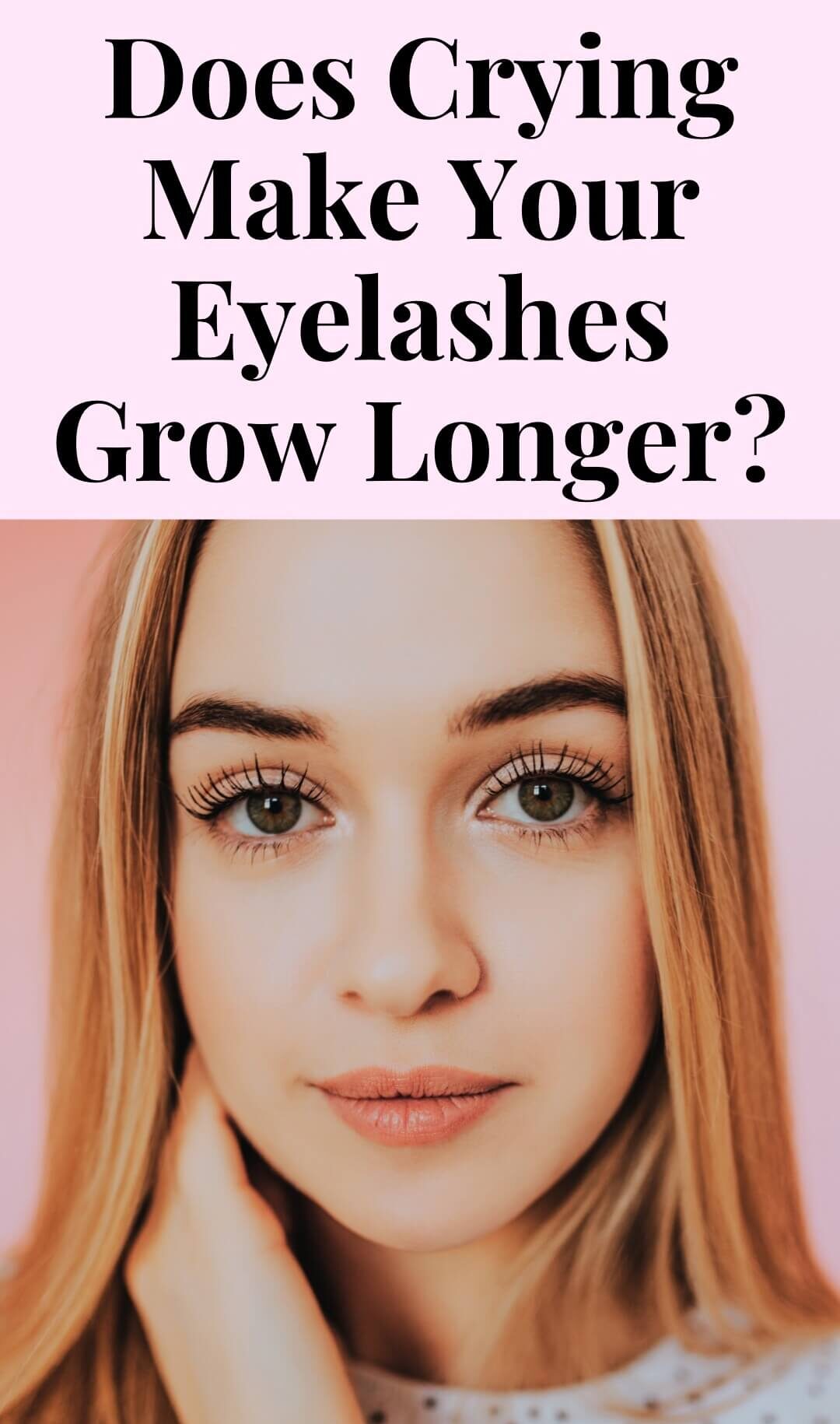 Sad-looking girl with extremely long eyelashes